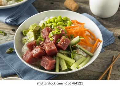 Raw Organic Ahi Tuna Poke Bowl With Rice And Veggies