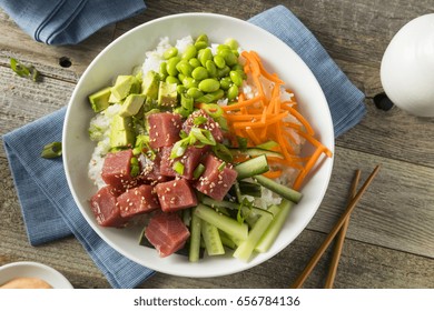 Raw Organic Ahi Tuna Poke Bowl With Rice And Veggies