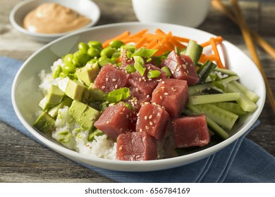 Raw Organic Ahi Tuna Poke Bowl With Rice And Veggies