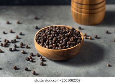 Raw Organic Black Peppercorns in a Bowl