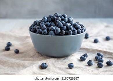 Raw Organic Blueberries in a Bowl, side view. 