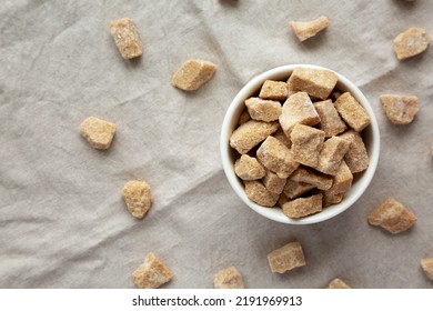 Raw Organic Demerara Granulated Brown Sugar In A Bowl, Top View. Flat Lay, Overhead, From Above. Space For Text.