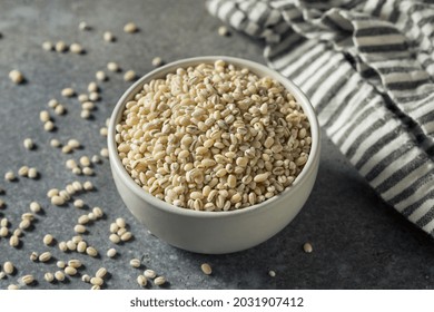 Raw Organic Dry Pearl Barley in a Bowl - Shutterstock ID 2031907412