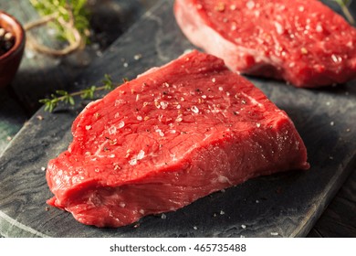 Raw Organic Grass Fed Sirloin Steak with Salt and Pepper
