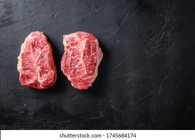 Raw Organic Meat Top Blade Steaks Or Australia Wagyu Oyster Blade On Black Background Top View Space For Text