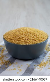 Raw Organic Stelline Pasta In A Bowl, Side View. Close-up.