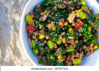 Raw Paleo Quinoa Kale Salad In A Bowl. Healthy Eating Diet Food.