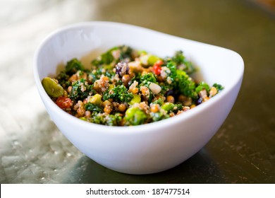 Raw Paleo Quinoa Kale Salad In A Bowl. Healthy Eating Diet Food.