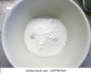 Raw Pancake Dough Flour in Plastic Bowl. - Shutterstock ID 1397987549
