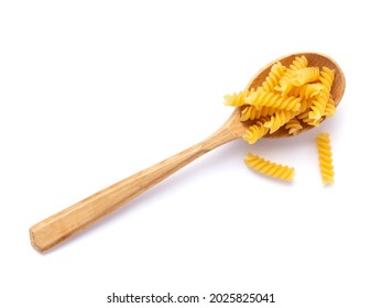 Raw pasta in spoon isolated on white. Pasta fusilli at white background - Powered by Shutterstock