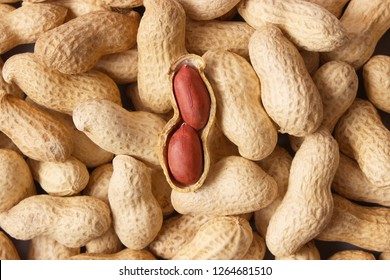 
raw peanuts in the shell, background