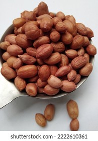 Raw Peanuts In A Stainless Steel Case.