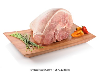 Raw Pernil (pernil Asado, Pernil Al Horno, Roast Pork Butt). A Slow-roasted Marinated Pork Leg Or Pork Shoulder, Ready To Be Cooked. On A Cutting Board With Peppers Aside, Isolated On White Background