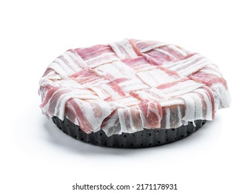 Raw pie  with bacon and onion isolated on white. Ready for baking 