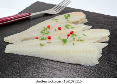 Raw Plaice Fillet On A Plate