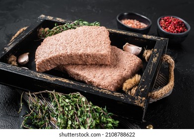 Raw Plant Based Vegan Mince Meat With Herbs. Black Background. Top View