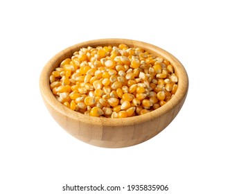 Raw Popcorn Grains In Wood Bowl Isolated On White Background. Dry Yellow Corns Seeds Or Sweetcorn Kernels