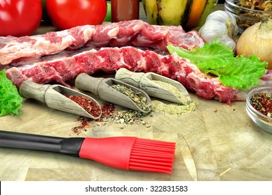 Raw Pork Baby Back Ribs On The Cutting Board Close-up