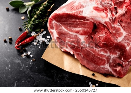 Raw Pork meat fillet. Pork meat, piece of meat close up. Prime filet meat texture. Chilled pork Boston butt, collar, shoulder. Steak. Raw pork neck, Spices