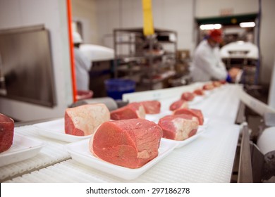 Raw Pork Meat At Packaging Packing Factory