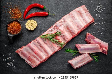 raw pork ribs on a stone background. Fresh pork meat - Powered by Shutterstock