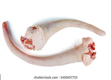 Raw Pork Tails Isolated On White Background