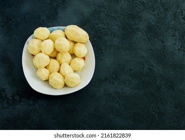 Raw Potato On Dark Background. Copy Space. Vegetable Food