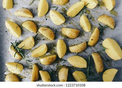 Raw Potato Wedges With Oil And Pepper On Baking Tray, Food Concept Background