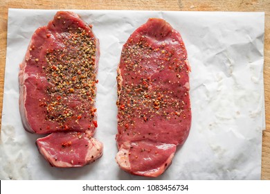 Raw Ranch Steaks With Seasoning 