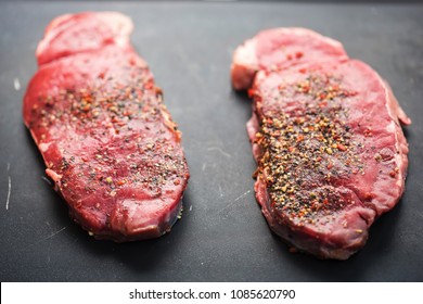 Raw Ranch Steaks With Seasoning