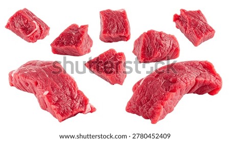 Raw red beef meat chunks showing freshness and protein content on a transparent background