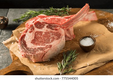 Raw Red Grass Fed Tomahawk Steaks with Rosemary
