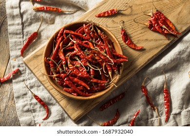 Raw Red Organic Chile De Arbol Peppers In A Bowl