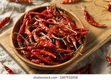 Raw Red Organic Chile De Arbol Peppers In A Bowl