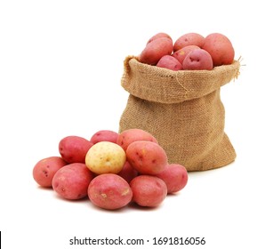 Raw Red Potatoes In Burlap Bag Isolated On White Background 