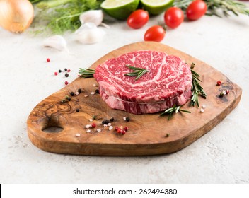 Raw Ribeye Steak With Herbs And Spices