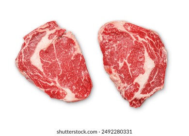 Raw ribeye steaks. Flat lay. Isolated on white background - Powered by Shutterstock