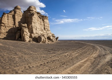 Raw Road With Rock Mountain And Nice Blue Sky