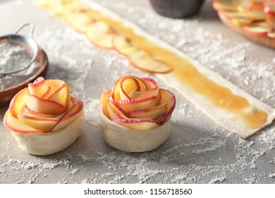 Raw Rose Shaped Apple Pastry On Table