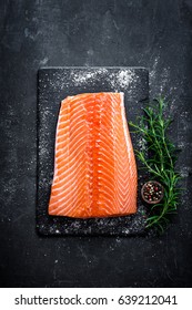 Raw Salmon Filet On Dark Slate Background, Wild Atlantic Fish