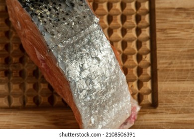 Raw Salmon Filets With Herbs And Spices On Baking Tray