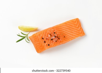 Raw Salmon Fillet On White Background