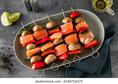 raw salmon skewers with vegetables. summer recipe cooking
