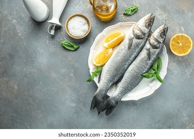 Raw seabass fish. Healthy food concept. place for text, top view.