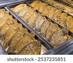 Raw seasoned pieces of giant gourami fish (Osphronemus goramy)