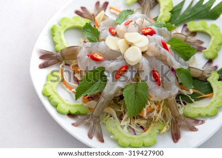 raw shrimp and spicy sauce, seafood thailand (spicy salad shrimp in fish sauce).