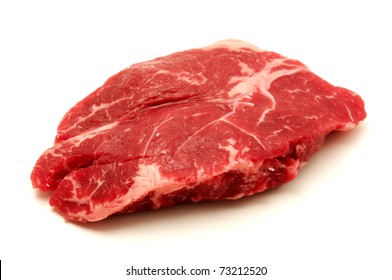 Raw Sirloin Steak On A White Background