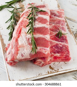 Raw Spare Ribs With Rosemary. Top View