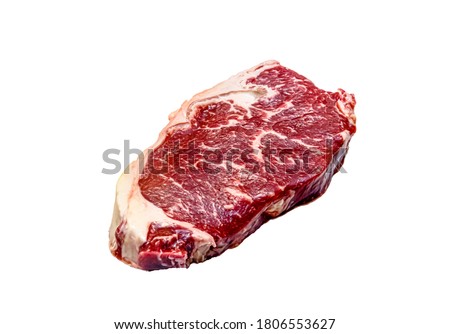 Raw Striploin steak (New York) from marbled beef on a white background, isolated