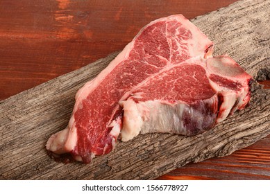 Raw Tbone Steak For Blessing Day And Christmas Holidays. A Piece Of Fresh Organic Farm Meat